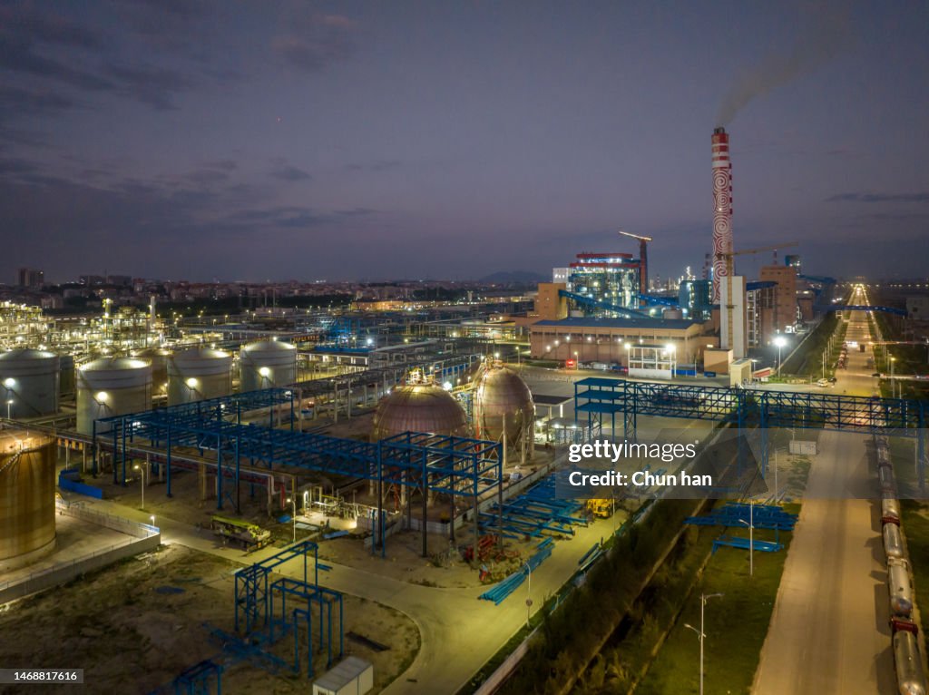 Aerial view of the chemical plant operating in the night