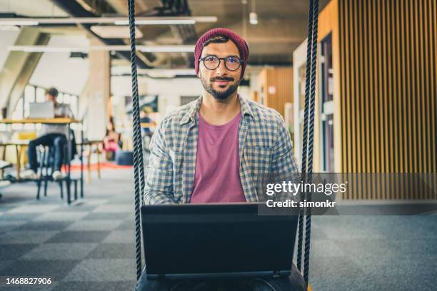 businessman working in office - pink hat stock pictures, royalty-free photos & images