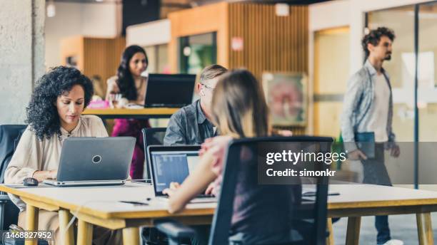 business people working in office - white collar worker stock pictures, royalty-free photos & images