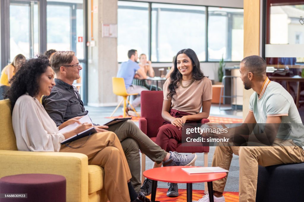 Businessman talking with colleagues