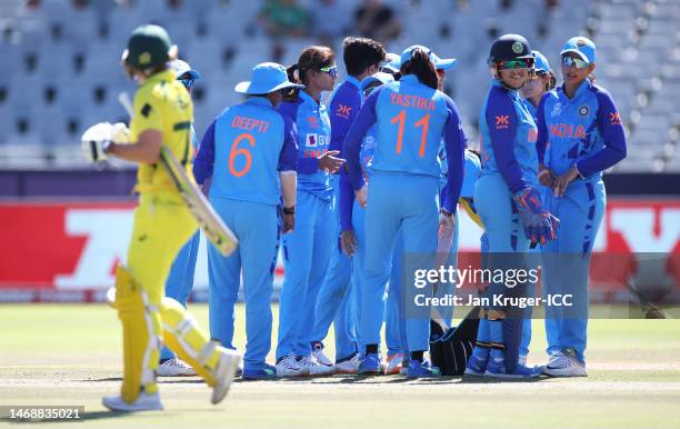 Radha Yadav of India celebrates the wicket of Alyssa Healy of Australia, stumped by team mate Richa Ghosh during the ICC Women's T20 World Cup Semi...