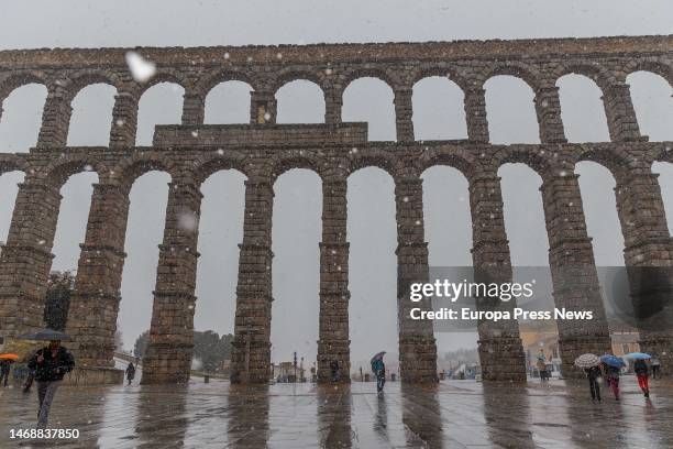The aqueduct while it snows, on 23 February, 2023 in Segovia, Castilla y Leon, Spain. The Government Delegation has activated the alert phase of the...
