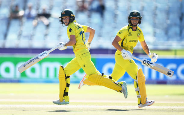 Meg Lanning and Ashleigh Gardner of Australia run between the wickets during the ICC Women's T20 World Cup Semi Final match between Australia and...