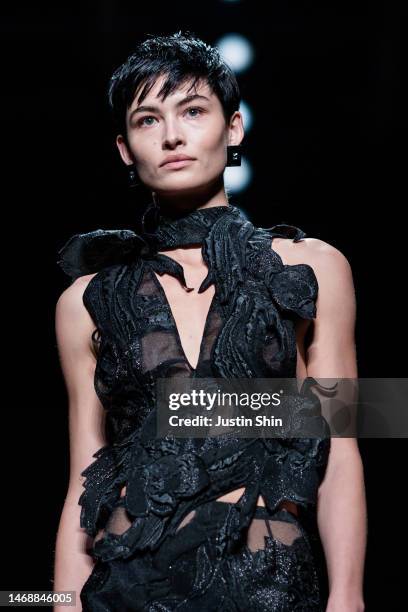 Model, hair and outfit detail, walks the runway at the Alberta Ferretti fashion show during the Milan Fashion Week Womenswear Fall/Winter 2023/2024...