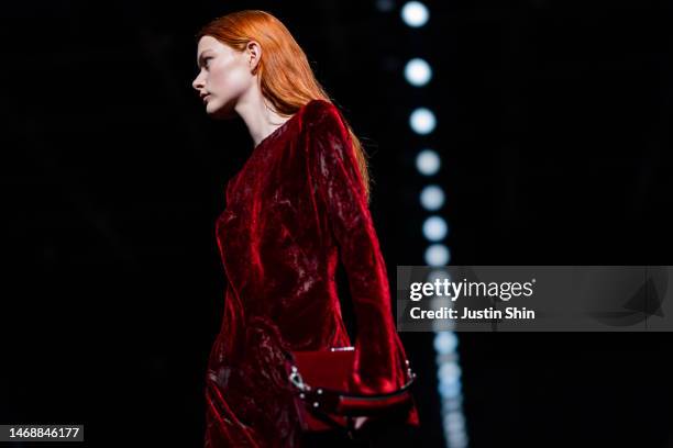 Model, hair and outfit detail, walks the runway at the Alberta Ferretti fashion show during the Milan Fashion Week Womenswear Fall/Winter 2023/2024...