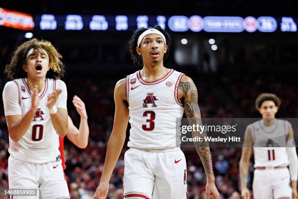 Nick Smith Jr. #3 of the Arkansas Razorbacks looks at a official during a game against the Georgia Bulldogs at Bud Walton Arena on February 21, 2023...