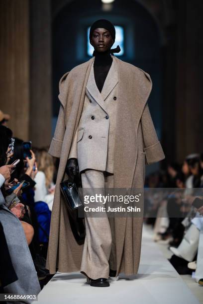 Model walks the runway at the Max Mara fashion show during the Milan Fashion Week Womenswear Fall/Winter 2023/2024 on February 23, 2023 in Milan,...