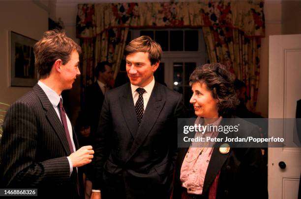 British Conservative Party politician Michael Portillo, Chief Secretary to the Treasury, speaks to two Lambeth councillors during a private meeting...