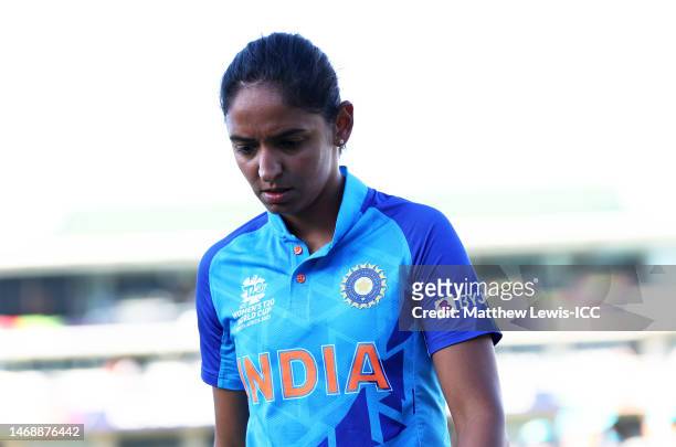 Harmanpreet Kaur of India cuts a dejected figure following the ICC Women's T20 World Cup Semi Final match between Australia and India at Newlands...