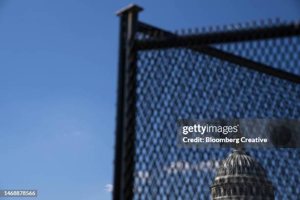 security fence outside the u.s. capitol building - capitol hill winter stock pictures, royalty-free photos & images