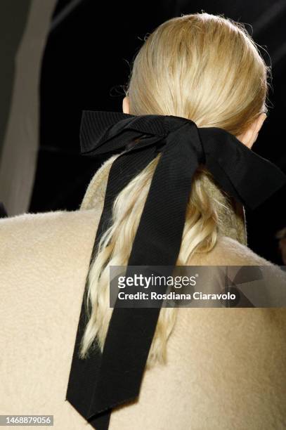 Model , hair detail, poses backstage at the Max Mara fashion show during the Milan Fashion Week Womenswear Fall/Winter 2023/2024 on February 23, 2023...