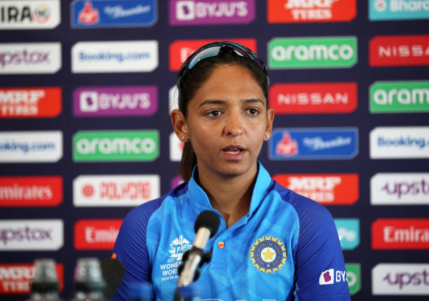 Harmanpreet Kaur of India looks on as they are interviewed following the ICC Women's T20 World Cup Semi Final match between Australia and India at...