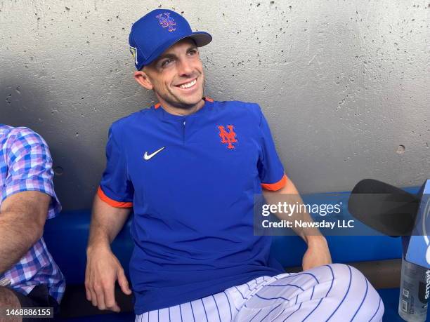 Former New York Mets player David Wright sits in the team's dugout during its spring training camp in Port St. Lucie, Florida, on March 31, 2022.