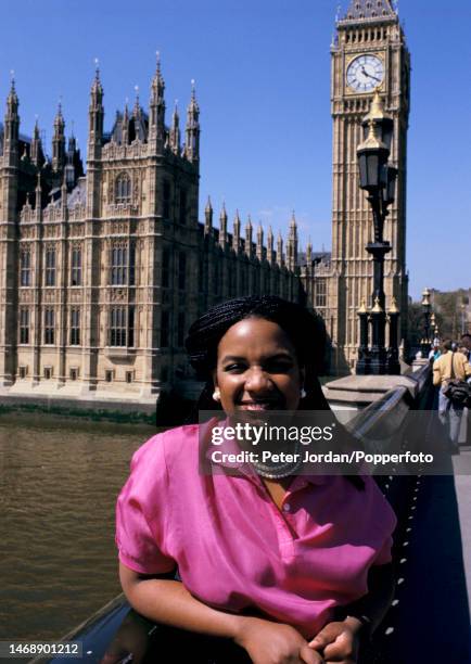 British Labour Party politician Diane Abbott stands on Westminster Bridge in front of the Big Ben clock tower of the Palace of Westminster in London...