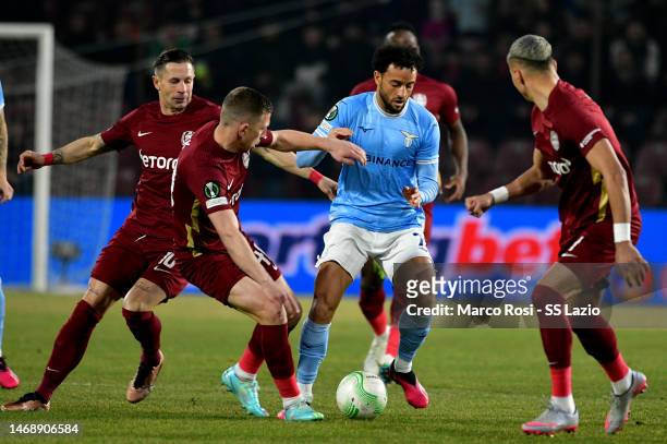 Felipe Anderson of SS Lazio compete for the ball wirh Ciprian Deac and Karlo Muhar of CFR Cluj during the UEFA Europa Conference League knockout...