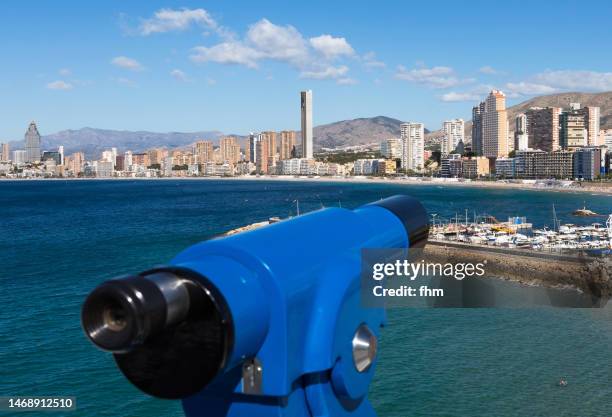 telescope to city skyline (benidorm, spain) - backdrop projection of beach stock pictures, royalty-free photos & images