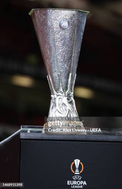 The UEFA Europa League trophy is seen prior to the UEFA Europa League knockout round play-off leg two match between Manchester United and FC...