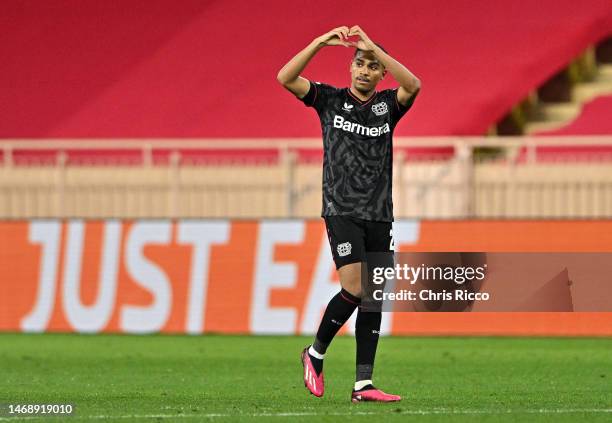 Amine Adli of Bayer 04 Leverkusen celebrates after scoring the team's third goal during the UEFA Europa League knockout round play-off leg two match...