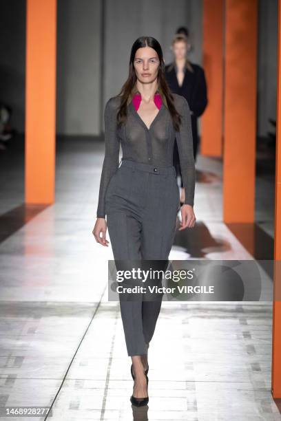 Model walks the runway during the Prada Ready to Wear Fall/Winter 2023-2024 fashion show as part of the Milan Fashion Week on February 23, 2023 in...