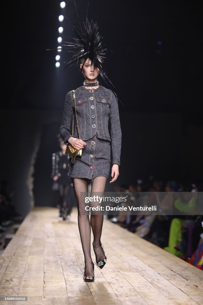 a-model-walks-the-runway-at-the-moschino-fashion-show-during-the-milan-fashion-week-womenswear.jpg