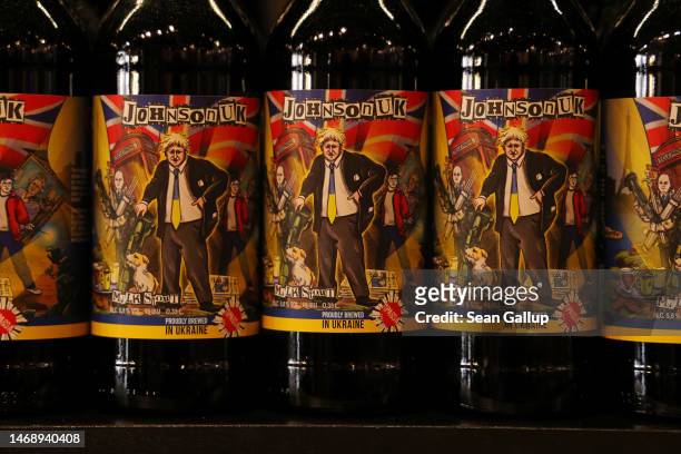 Locally-produced stout beer featuring former British Prime Minister Boris Johnson stand on display for sale in a shop in the city center on February...