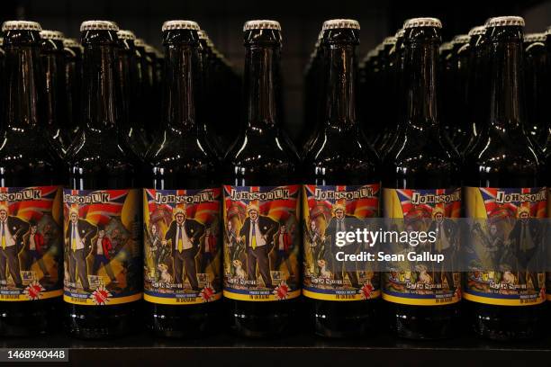 Locally-produced stout beer featuring former British Prime Minister Boris Johnson stand on display for sale in a shop in the city center on February...