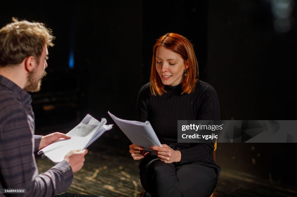 Performer With Script Actors Rehearsing With Scripts On Stage In Theatre High-Res Stock Photo ...