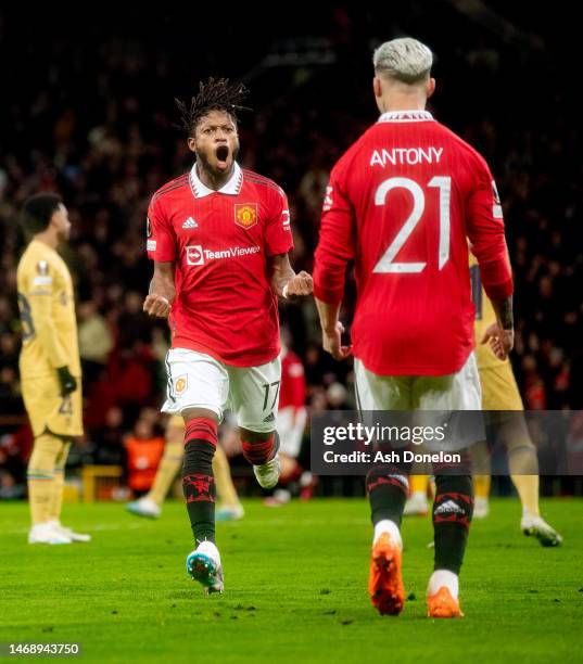 Fred of Manchester United celebrates after scoring their sides first goal during the UEFA Europa League knockout round play-off leg two match between...