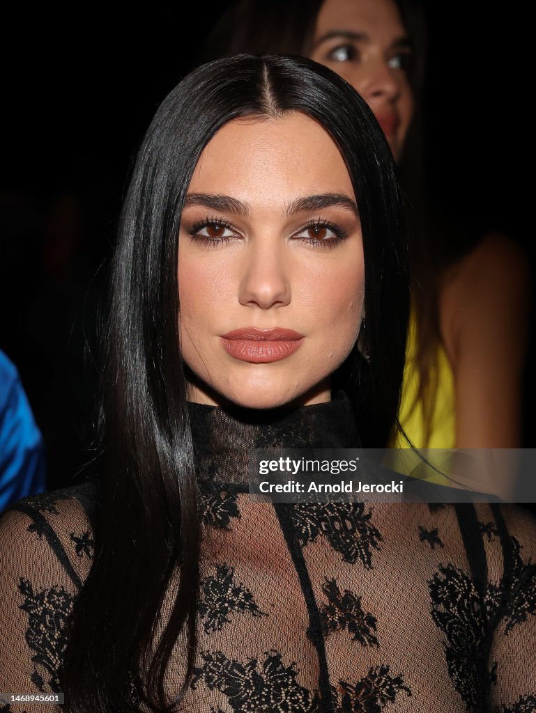 Dua Lipa is seen on the front row of the GCDS fashion show during the