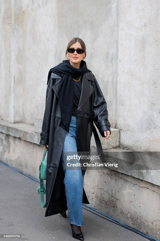 Darja Barannik wears black leather coat, green bag, denim jeans... News ...