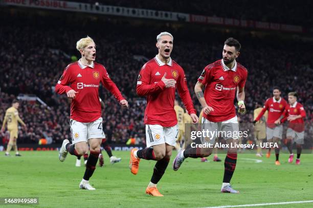 Antony of Manchester United celebrates with teammates Bruno Fernandes and Alejandro Garnacho after scoring the team's second goal during the UEFA...