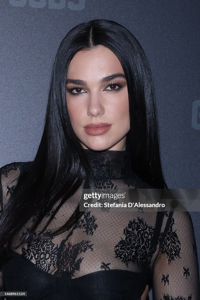 Dua Lipa is seen on the front row of the GCDS fashion show during the