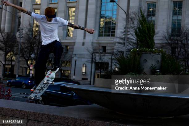 People skateboard on Freedom Plaza on February 23, 2023 in Washington, DC. Temperatures in parts of DC reached a high of almost 80 degrees,...