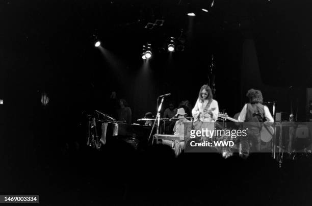 Neil Young performs onstage during the opening of the Roxy Theatre in Hollywood, California, on September 19, 1973.