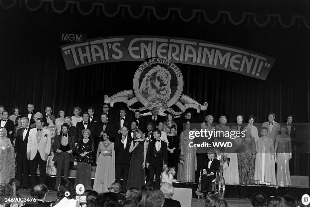 Movie stars including Gloria Swanson, James Stewart, Johnny Weissmuller, Russ Tamblyn, Elizabeth Taylor, Keenan Wynn, Shirley MacLaine, Roddy...