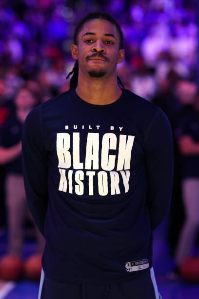 Ja Morant of the Memphis Grizzlies looks on before playing against the Philadelphia 76ers at Wells Fargo Center on February 23, 2023 in Philadelphia,...