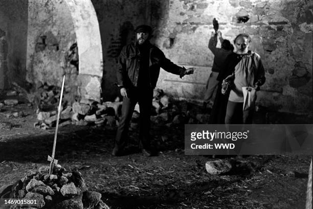 Juan Luis Bunuel and Michel Piccoli prepare for filming during production of 'Leonor' in Caceres, Spain, on November 20, 1974.