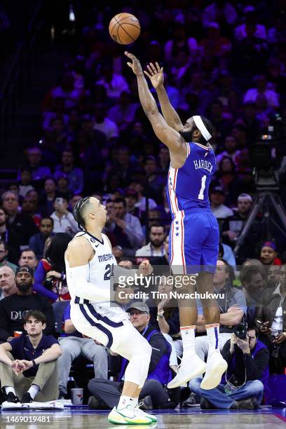 James Harden of the Philadelphia 76ers shoots over Dillon Brooks of the Memphis Grizzlies during the second quarter at Wells Fargo Center on February...