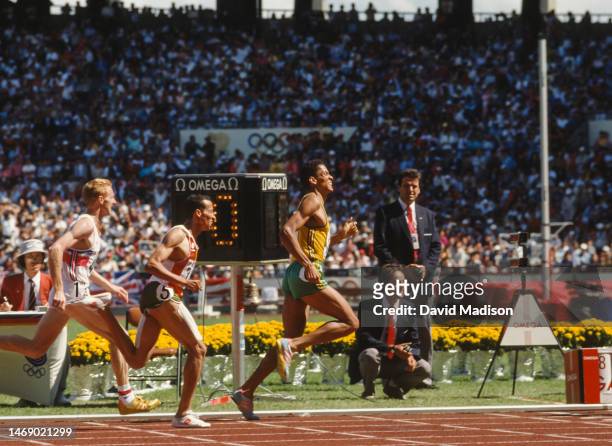Peter Elliott of Great Britain, Said Aouita of Morocco, and Joaquim Cruz of Brazil race to the finish of the Men's 800 meters event of the 1988...