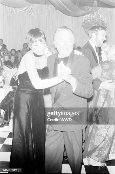 Liza Minnelli, Jack Haley Sr., Jack Haley Jr., and Florence McFadden Haley dance during a party at Art Loboe's in Los Angeles, celebrating the recent...