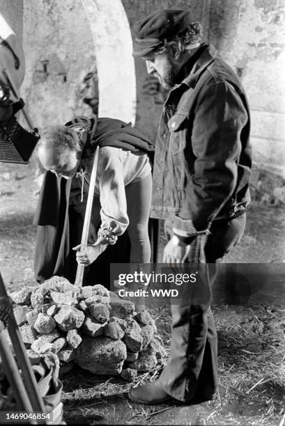 Michel Piccoli and Juan Luis Bunuel prepare for filming during production of 'Leonor' in Caceres, Spain, on November 20, 1974.