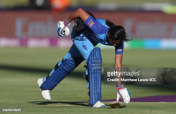 Harmanpreet Kaur of India makes their way off after being dismissed during the ICC Women's T20 World Cup Semi Final match between Australia and India...