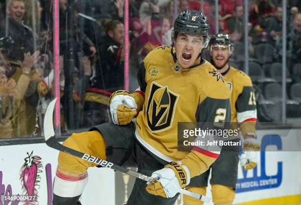 Zach Whitecloud of the Vegas Golden Knights celebrates after scoring a goal during the third period against the Calgary Flames at T-Mobile Arena on...
