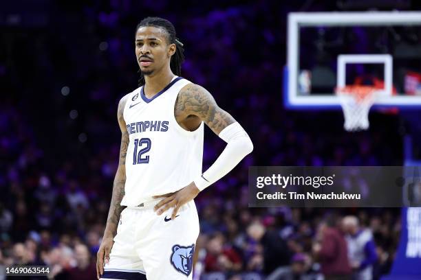 Ja Morant of the Memphis Grizzlies looks on during the third quarter against the Philadelphia 76ers at Wells Fargo Center on February 23, 2023 in...