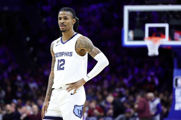 Ja Morant of the Memphis Grizzlies looks on during the third quarter against the Philadelphia 76ers at Wells Fargo Center on February 23, 2023 in...