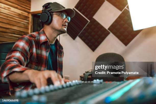 Engineering In Music 60 Sound Engineers Working On Mixer Stock Photos, High-Res Pictures ...