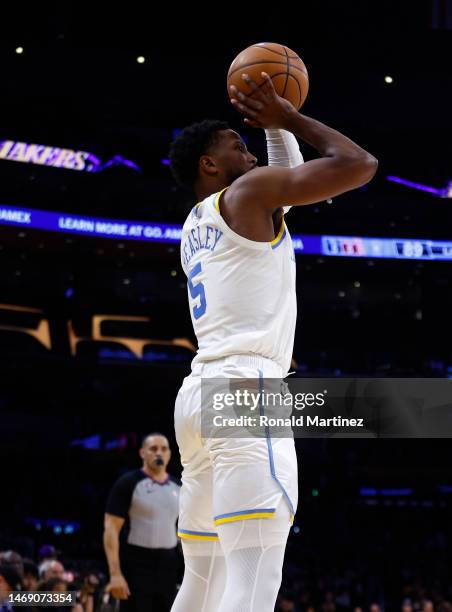 Malik Beasley of the Los Angeles Lakers makes a three-point shot against the Golden State Warriors in the second half at Crypto.com Arena on February...