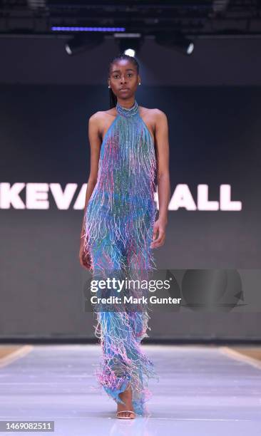 Model walks the runway wearing Kevan Hall for the 54th NAACP Image Awards Fashion Show at L.A. LIVE on February 23, 2023 in Los Angeles, California.