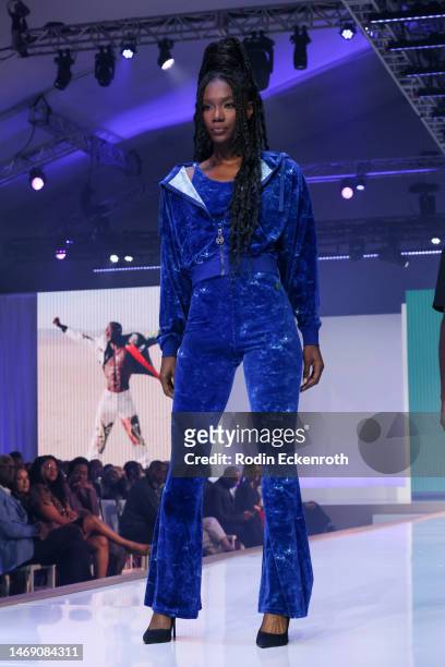Model walks the runway wearing Cross Colours at the 54th NAACP Image Awards nominees reception and fashion show at L.A. Live Event Deck on February...