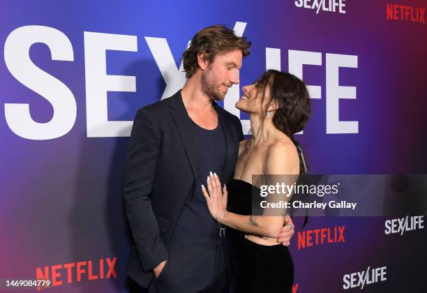 Adam Demos and Sarah Shahi attend Netflix's "Sex/Life" Season 2 Special Screening at the Roma Theatre at Netflix - EPIC on February 23, 2023 in Los...